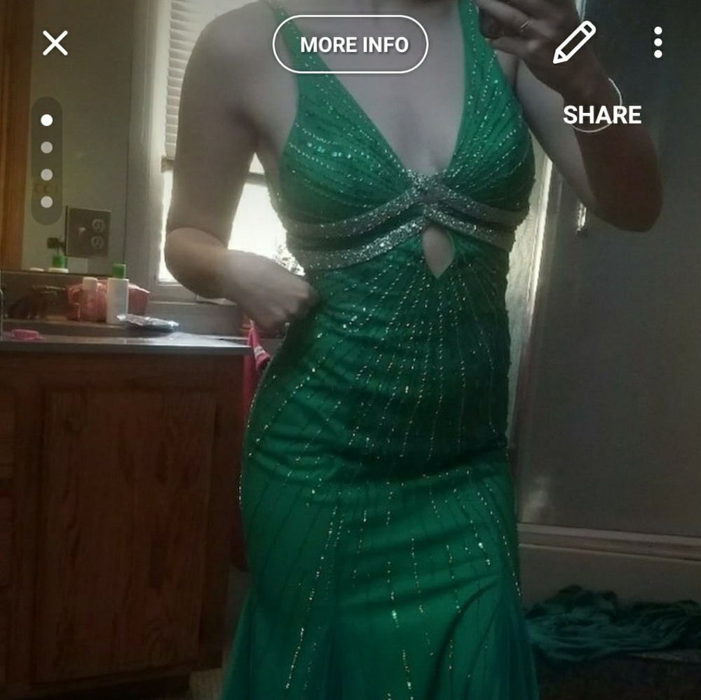 Beaded green strappy prom gown